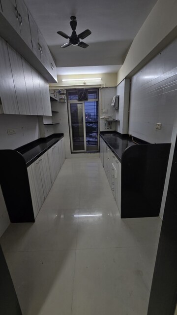 Kitchen in 2 BHK Apartment at Mathura Vihar CHS, Borivali West – for Rent
