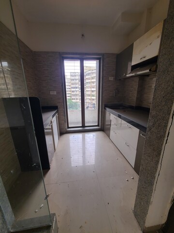Kitchen in 1 BHK Apartment at Viva  Kingston Crown, Virar West – for Sale