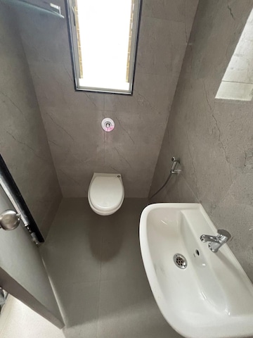 Bathroom in 1 BHK Apartment at Varanasi Society, Warje – for Rent