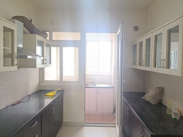 Kitchen in 3 BHK Apartment at Pashmina Waterfront, Old Madras Road – for Rent