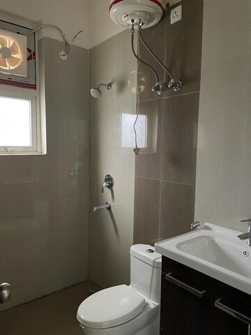 Bathroom in 4 BHK Apartment at Ansal API Esencia, Sector 67 – for Rent