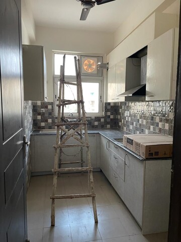 Kitchen in 4 BHK Apartment at Ansal API Esencia, Sector 67 – for Rent