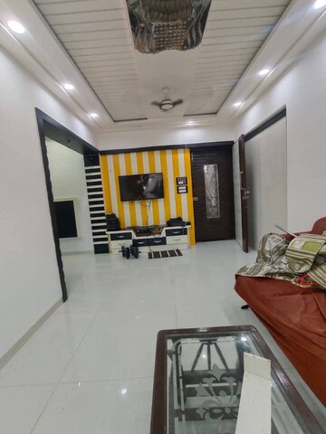 Living Room in 2 BHK Apartment at Mangesh CHS, Andheri West – for Rent