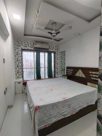 Bedroom in 2 BHK Apartment at Mangesh CHS, Andheri West – for Rent