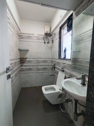 Bathroom in 2 BHK Apartment at Mangesh CHS, Andheri West – for Rent