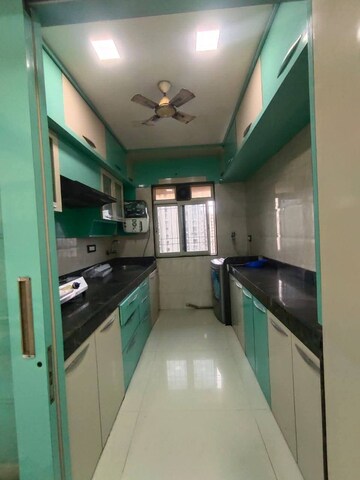 Kitchen in 2 BHK Apartment at Mangesh CHS, Andheri West – for Rent