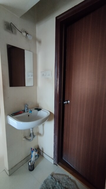 Bathroom in 1 BHK Apartment at Raunak City Sector 4 D4, Kalyan West – for Rent