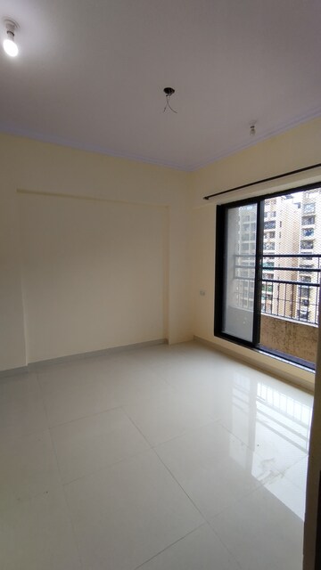 Room in 1 BHK Apartment at Raunak City Sector 2 B7, Kalyan West – for Rent