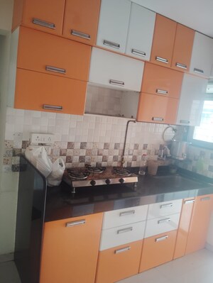 Kitchen in 1 BHK Apartment at Cosmos Orchid, Ghodbunder Road – for Sale