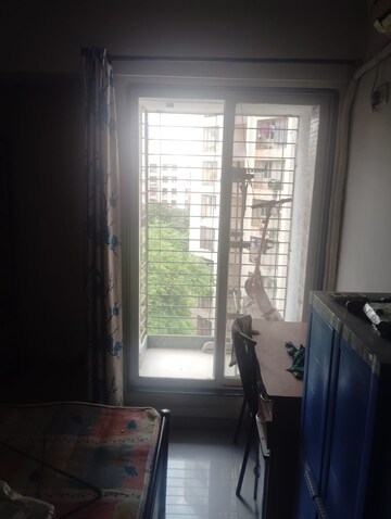 Living Room in 1 BHK Apartment at Cosmos Orchid, Ghodbunder Road – for Sale