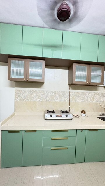 Kitchen in 2 BHK Apartment at Hiranandani Garden Blue Bell, Powai – for Rent