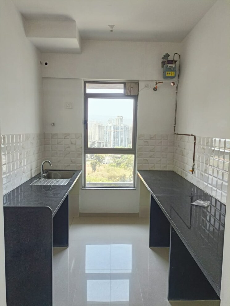 Kitchen, kalpataru-immensa 2 Bedroom 599 Sq.Ft. Apartment In Kolshet Road Thane 8944678