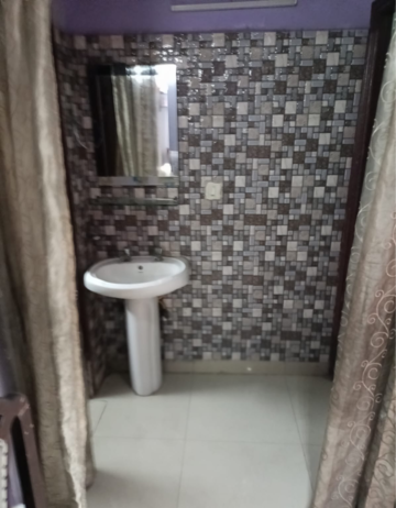 Bathroom in 2 BHK Apartment at Mahagun Mahagunpuram II, Pandav Nagar – for Sale