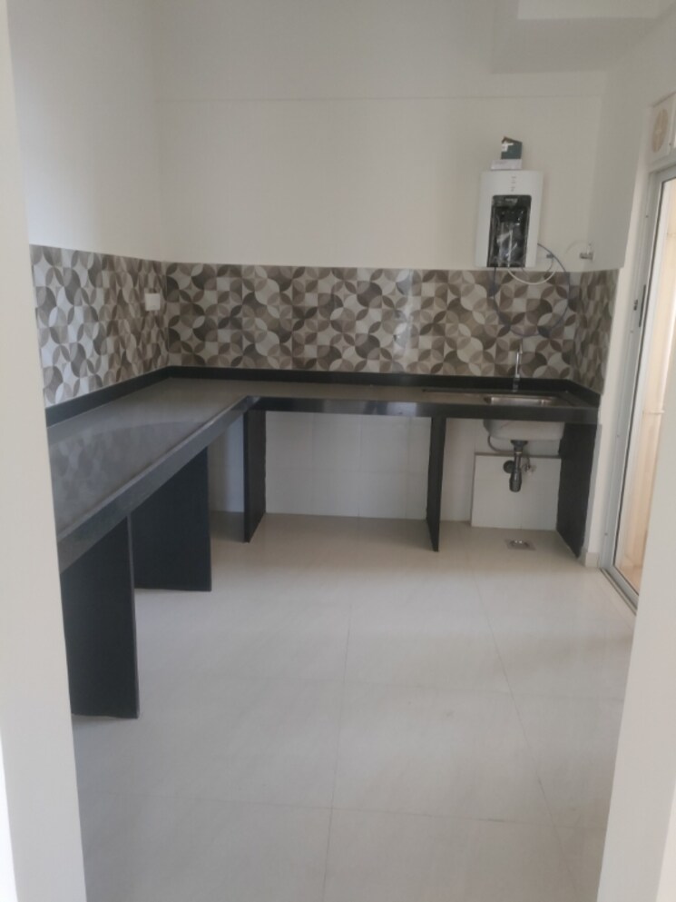 Kitchen, lodha-bella-vita 2 Bedroom 814 Sq.Ft. Apartment In Nibm Road Pune 8944748