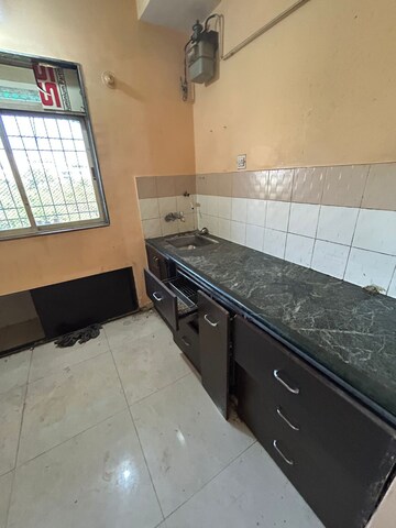 Kitchen in 2 BHK Apartment at Swastik Residency 1, Ghodbunder Road – for Rent