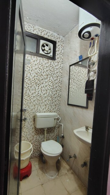 Bathroom in 2 BHK Builder Floor at Dwarka Mor – for Rent