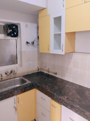 Kitchen in 2 BHK Apartment at Paras Seasons, Sector 168 – for Rent