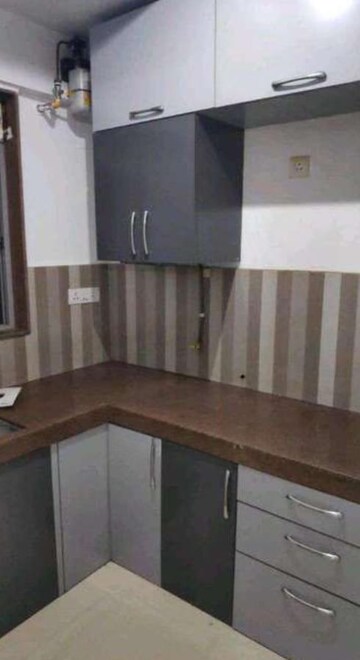 Kitchen in 1 BHK Apartment at Cosmos Regency Kavesar, Kavesar – for Rent