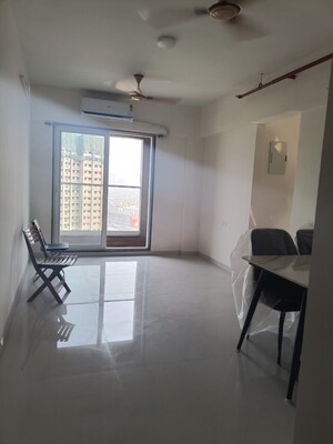 Living Room in 2 BHK Apartment at Ashar Axis, Majiwada – for Sale