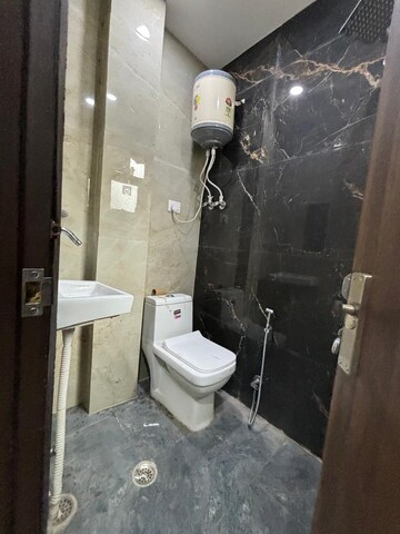 Bathroom in 3 BHK Builder Floor at Freedom Fighters Enclave – for Rent
