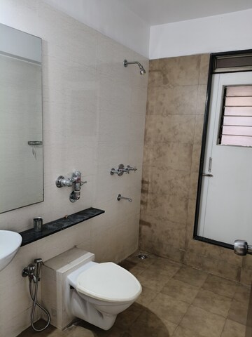 Bathroom in 3 BHK Apartment at Neelkanth Heights Shivai Nagar, Shivai Nagar – for Sale