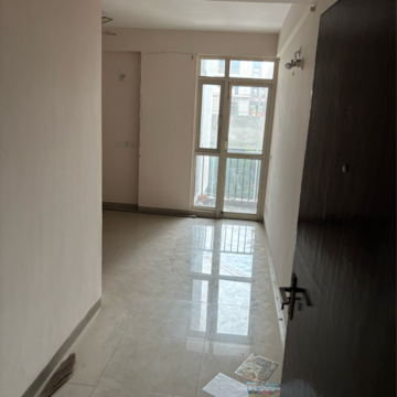 Living Room in 2 BHK Apartment at Wave Dream Homes, Ram Nagar – for Rent