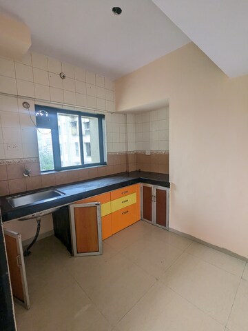 Kitchen in 1 BHK Apartment at Amrut Aangan, Kalwa – for Rent