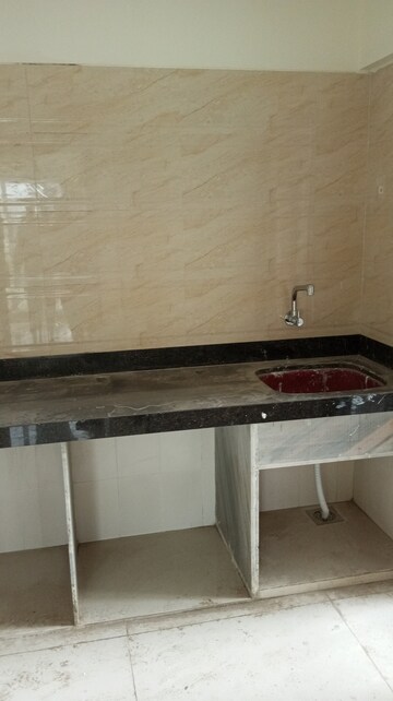 Kitchen in 2 BHK Apartment at Bhagwati Belmont, Haware City – for Sale