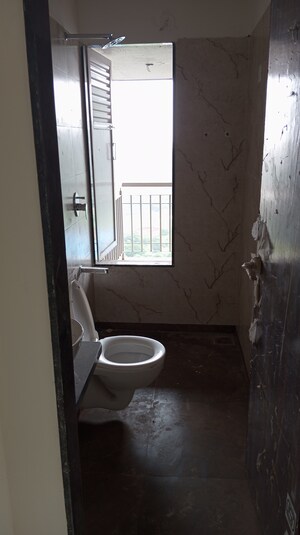Bathroom in 2 BHK Apartment at Bhagwati Belmont, Haware City – for Sale