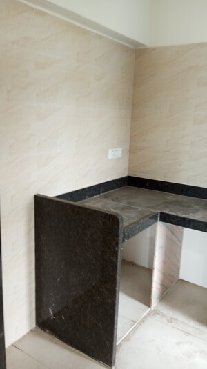 Kitchen in 2 BHK Apartment at Bhagwati Belmont, Haware City – for Sale