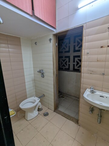 Bathroom in 2 BHK Apartment at Dosti Group Maitri Vatika, Kalwa – for Rent