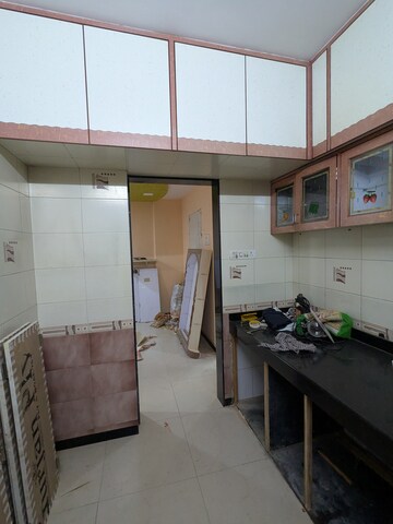 Kitchen in 2 BHK Apartment at Dosti Group Maitri Vatika, Kalwa – for Rent