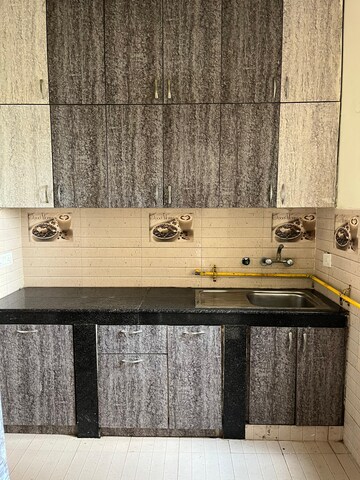 Kitchen in 2 BHK Apartment at Urbtech Xaviers, Sector 168 – for Rent