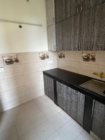 Kitchen in 2 BHK Apartment at Urbtech Xaviers, Sector 168 – for Rent