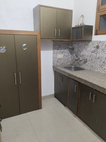 Kitchen in 1 RK Builder Floor at Vipul Khand – for Rent