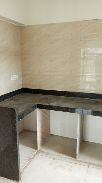 Kitchen in 2 BHK Apartment at Bhagwati Belmont, Haware City – for Sale