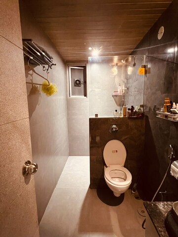 Bathroom in 4 BHK Apartment at Vesu – for Sale