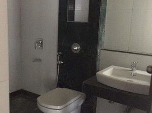 Bathroom in 1 BHK Apartment at Haware Dahlia, Kasarvadavali – for Sale