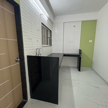 Kitchen in 1 BHK Apartment at Wadgaon Sheri – for Sale