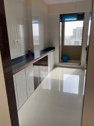 Kitchen in 1 BHK Apartment at Highland Park CHS, Kandivali West – for Rent