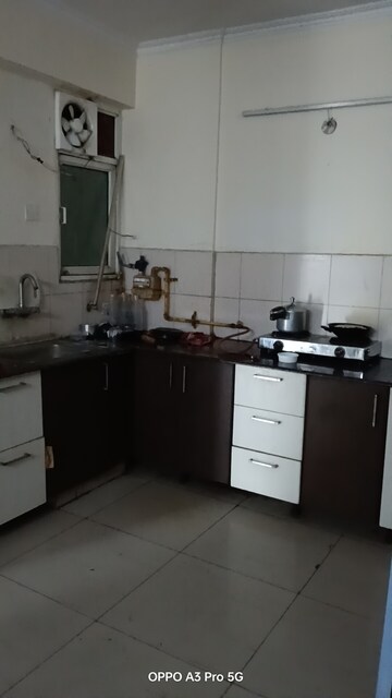 Kitchen in 2 BHK Apartment at Gaurs Global Village, Sain Vihar – for Rent