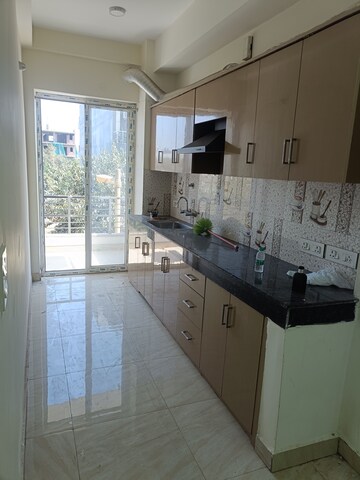 Kitchen in 2 BHK Builder Floor at Ansal API Esencia, Sector 67 – for Rent