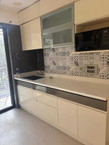Kitchen in 2 BHK Apartment at Raheja Classique, Shashtri Nagar – for Rent