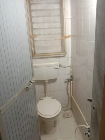 Bathroom in 1 RK Apartment at Dahiwali CHS, Dahisar West – for Sale