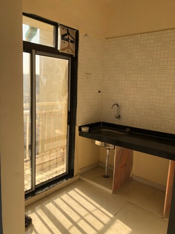 Kitchen in 2 BHK Apartment at Neel Dhara, Karanjade – for Rent