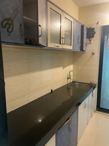 Kitchen in 2 BHK Apartment at Mahavir Heritage CHS, Kharghar Sector 35g – for Rent