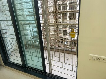 Balcony in 2 BHK Apartment at Mahavir Heritage CHS, Kharghar Sector 35g – for Rent