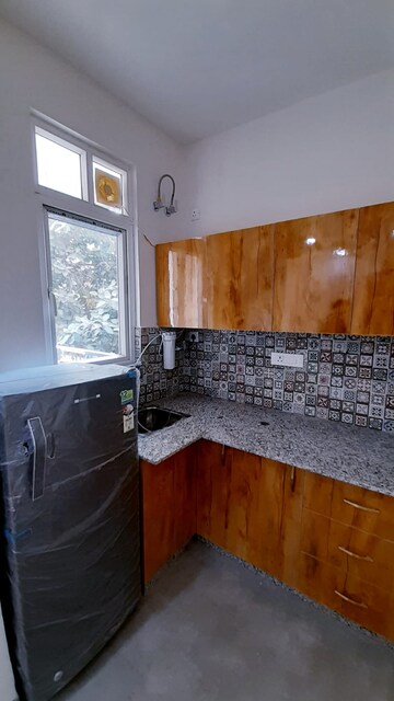 Kitchen in 4 BHK Builder Floor at Sushant Lok I – for Rent