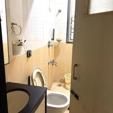 Bathroom in 2 BHK Apartment at Parag Mansion Chs , Andheri West – for Rent