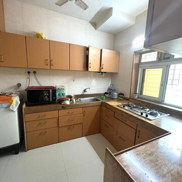 Kitchen in 2 BHK Apartment at Parag Mansion Chs , Andheri West – for Rent